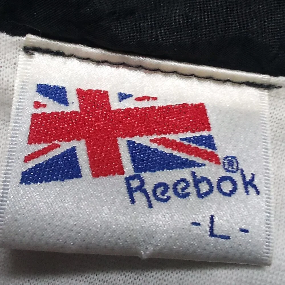 Vintage 80s Reebok Crest Logo Windbreaker Jacket